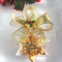 Stelle natalizie di plexiglass con stella decorata e stelle al cioccolato bianco all'interno